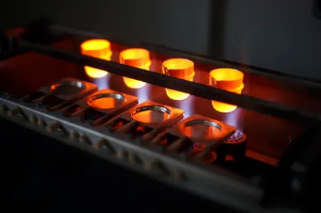 Fire assay furnace with crucibles